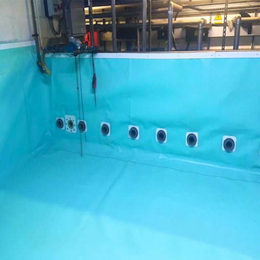 Process water tank internal lining